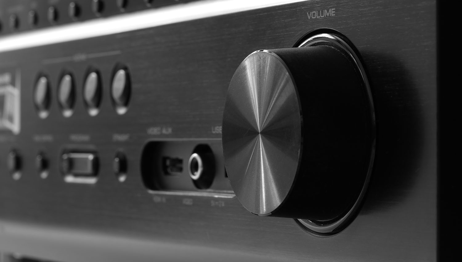 Front side of the AV receiver with volume knob close-up
